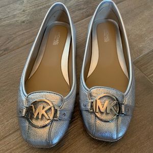 Michael silver emblem slip-on’s